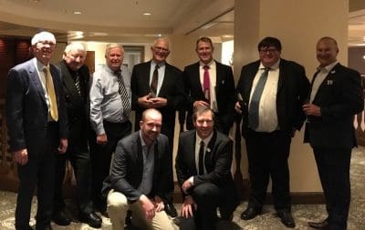 AMA presidents: (standing) Phil Smith (1986–1992), Brian Cowan (1992–1998), Brian Algate (2003–2005), Denis Logan (1998–2003), Rob Anderson (2013–2016), Stephen Donnelly (2005–2008), Dale Reeves (2008–2010), (front) Todd Jorgensen (2010–2013), Mark Schmidt (Current).