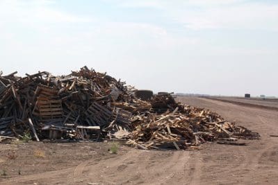 Pallets are used as a source of wood chip for making compost.