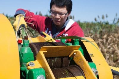 Haibo Huang, an assistant professor at the Virginia Polytechnic Institute and State University, squeezes bio-oil out of petross sugarcane to process into biodiesel. Photo: Haley Ahlers/Petross