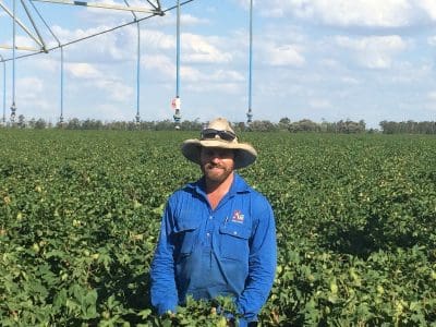 Darling Downs Cotton Grower of the Year, Ross Uebergang, with one of the centre-pivots that underpins the irrigation enterprise on "Tinobah", Miles.